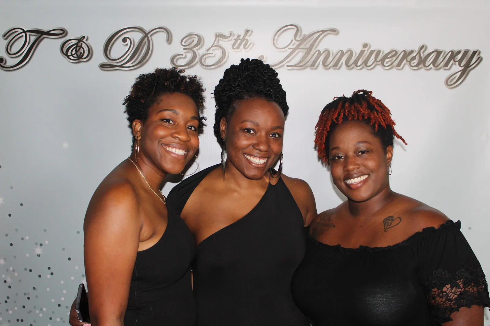 C. Draughan with two friends at the anniversary celebration